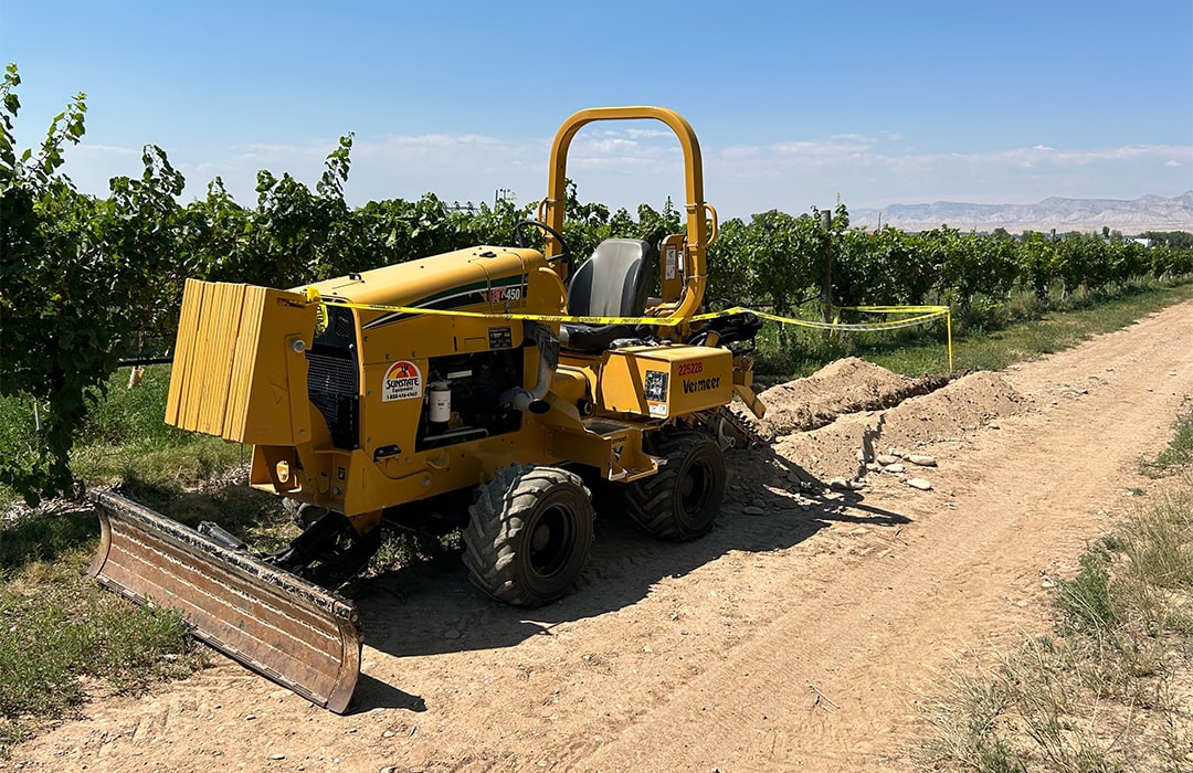 A ditch digger at the agrivoltaics project